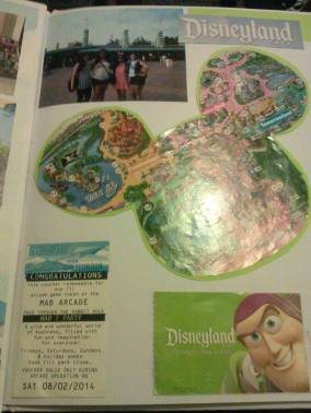 And this is from Disneyland. This one definitely consists of more scraps than pics. I have the Disneyland map in the shape of a Mickey head, my ticket, and a fast past that I never used. 